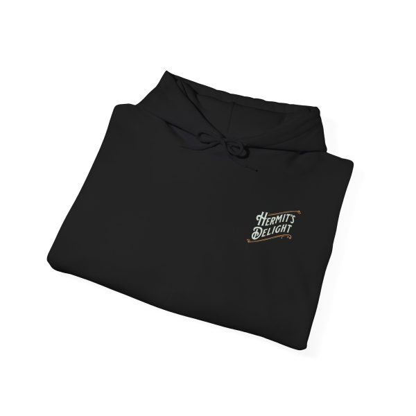 unisex heavy blend™ hooded sweatshirt, folded, showing the hermit's delight logo in the top left corner