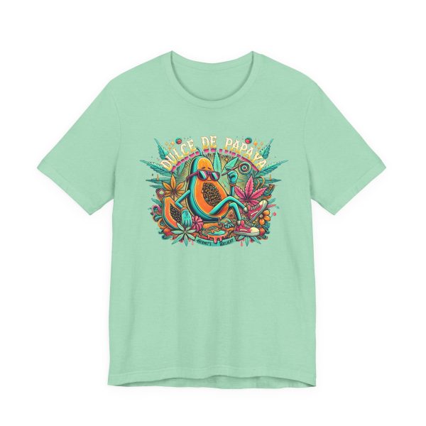 mint t-shirt with a colorful graphic of a lounging papaya character wearing sunglasses, surrounded by marijuana leaves and the words “Dulce de Papaya” in bold text above.