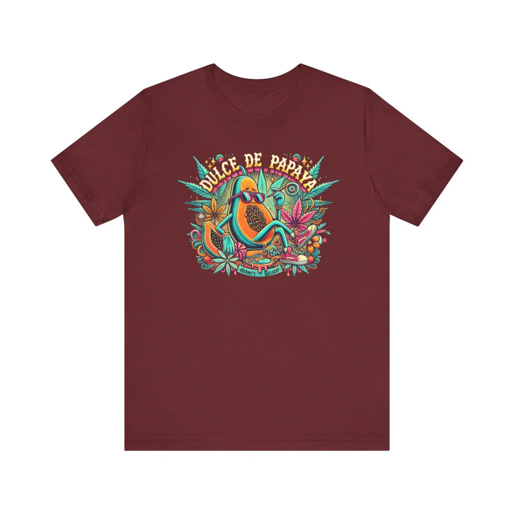 deep red t-shirt with a colorful graphic of a lounging papaya character wearing sunglasses, surrounded by marijuana leaves and the words “Dulce de Papaya” in bold text above.