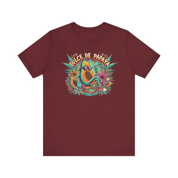 deep red t-shirt with a colorful graphic of a lounging papaya character wearing sunglasses, surrounded by marijuana leaves and the words “Dulce de Papaya” in bold text above.